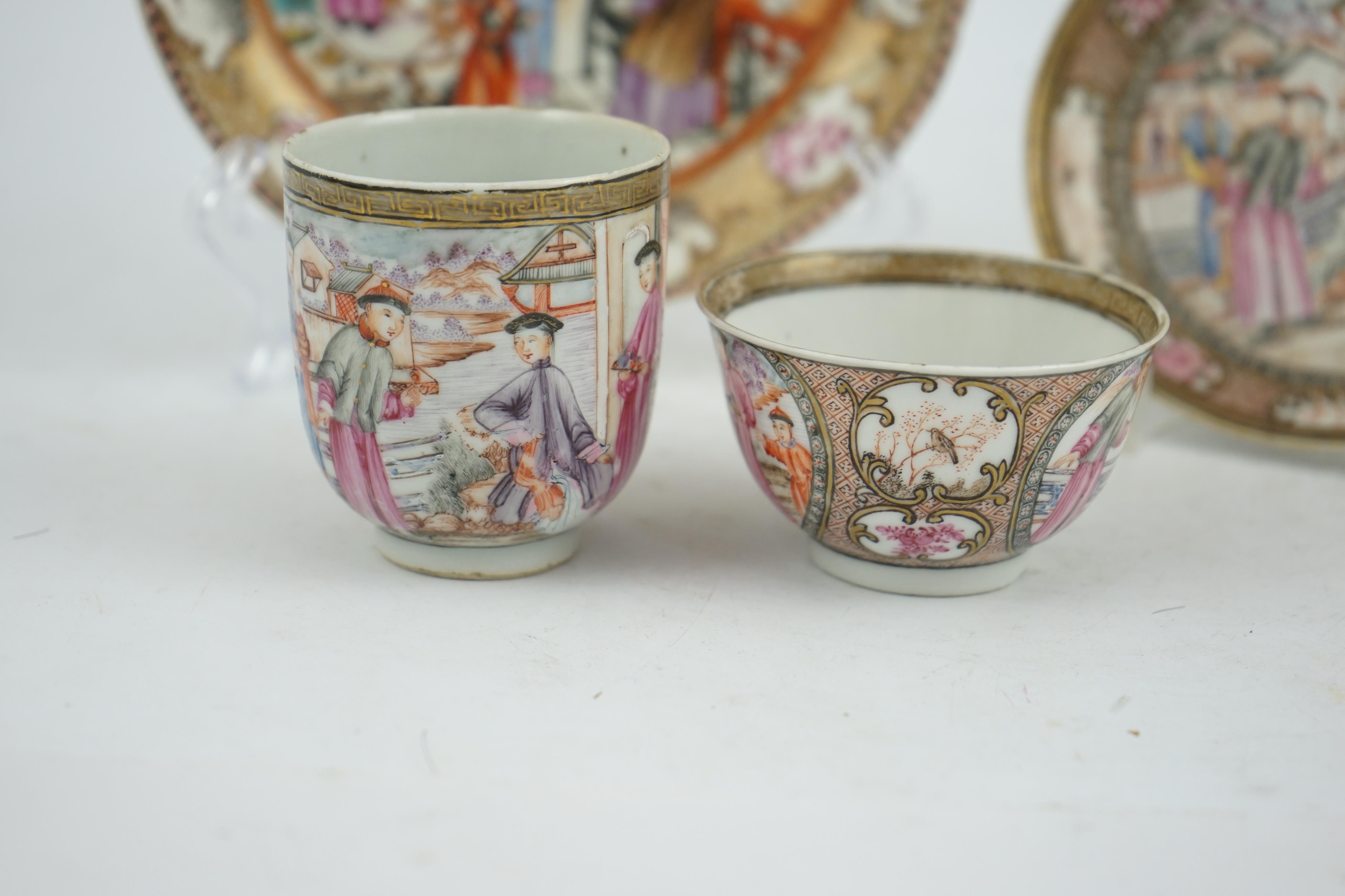 A Chinese ‘mandarin’ pattern tea bowl, coffee cup and saucer, Qianlong period